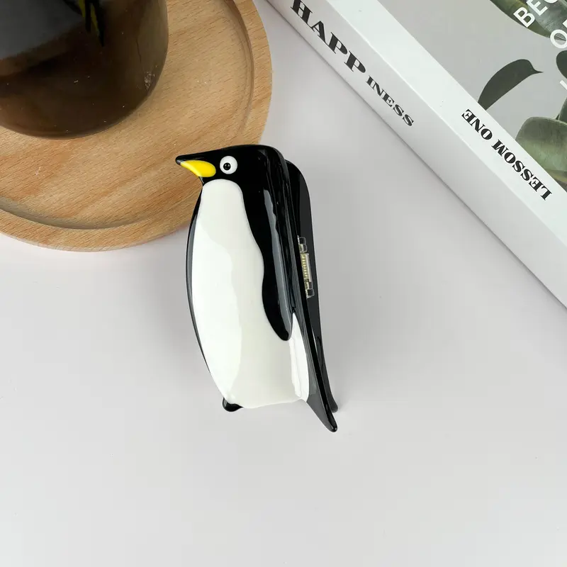 Pince à cheveux pingouin